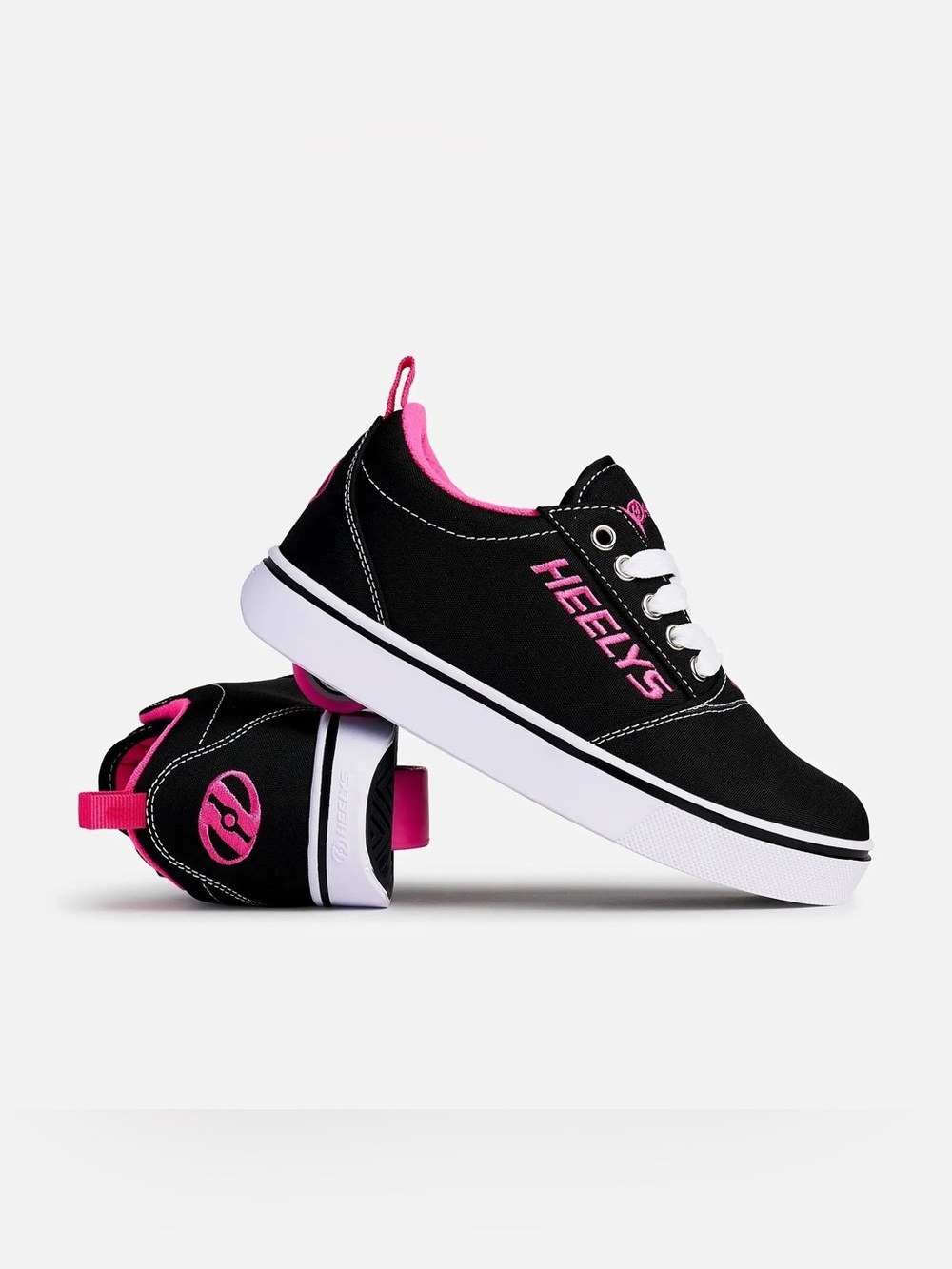 Heelys  pro 20 Black Canvas Skate Shoes with Pink Accents, like new yth 6/ W7